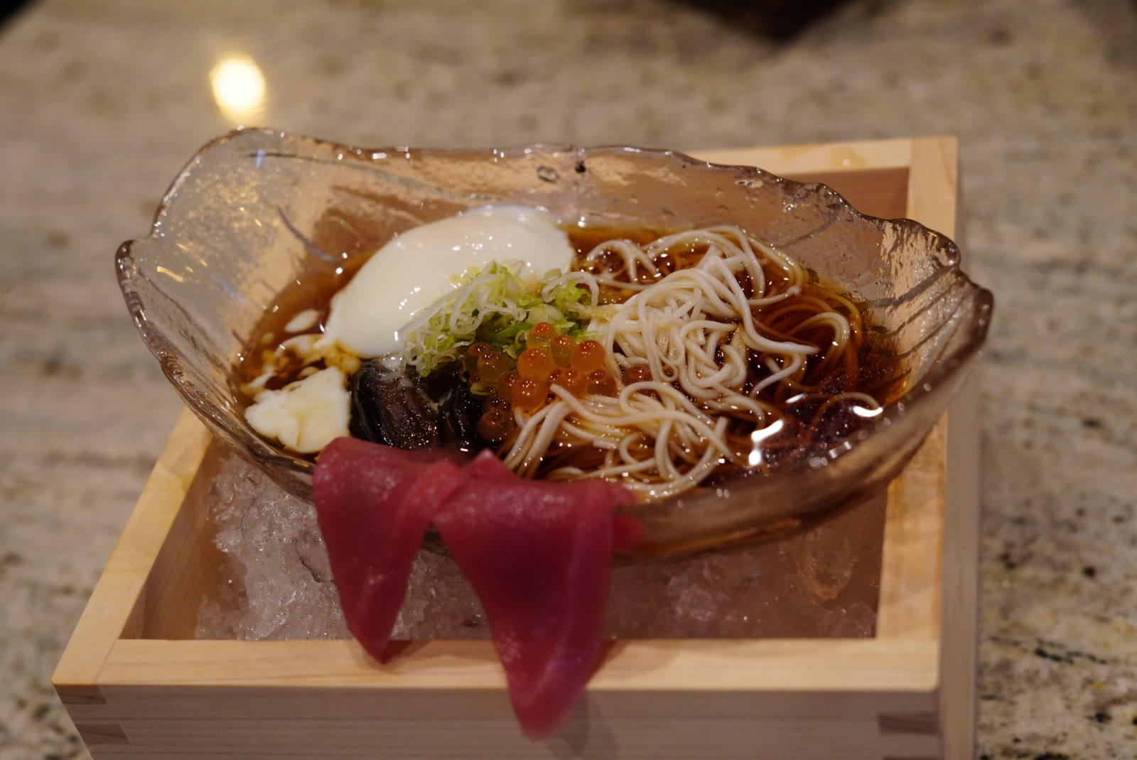 Chilled noodles with tuna, onsen egg and ikura in dashi